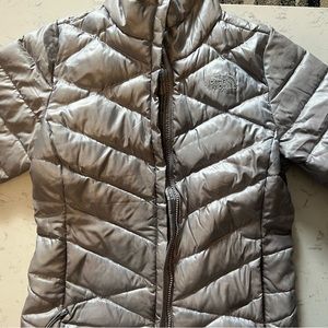 Silver puffer north face jacket